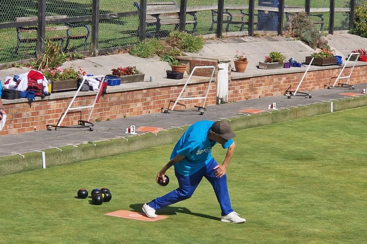 Jim Harvey in action during his marathon charity bowls challenge.