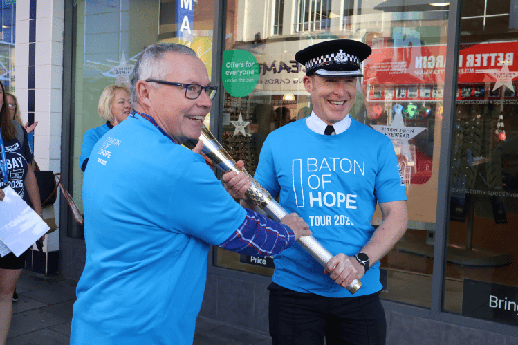 Torbay Cllr Nick Bye passes the baton to Chief Supt Roy Linden