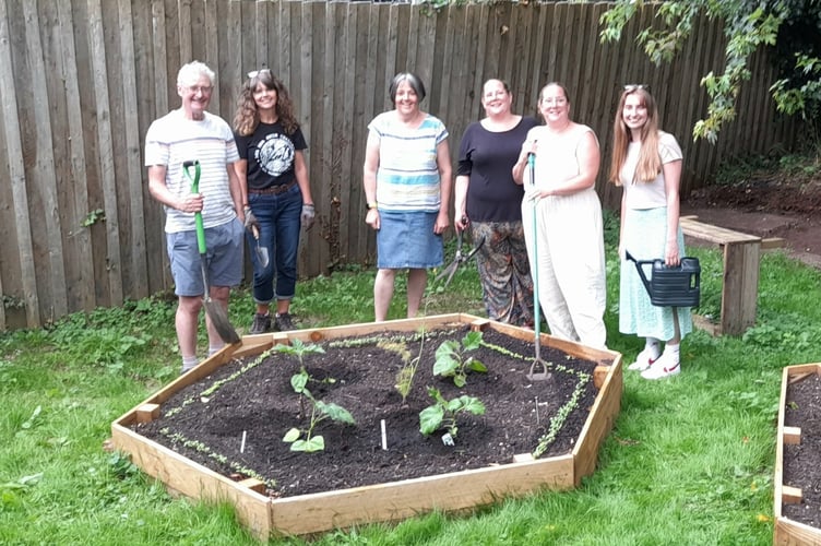 Pictured at the Courtenay Centre garden are (L-R) Steve Garlick; Newton Abbot Allotment Association, Linda Robson-Burrell; Newton Abbot Seed Library, Emily Farrell; Newton Abbot CIC, Kylie Dawe; Newton Abbot Centre Association, Emma Dawe; Newton Abbot CIC and Olivia Walker, Newton Abbot Centre Association.