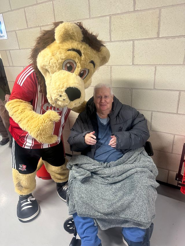 Bob Rackley with the Exeter City mascot at St James Park.