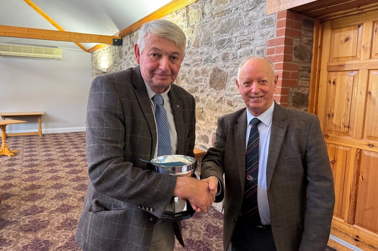 Alan Bickley won the Devon Multi-furrow trophy, presented by President Raymond Govier.  AQ 7131
