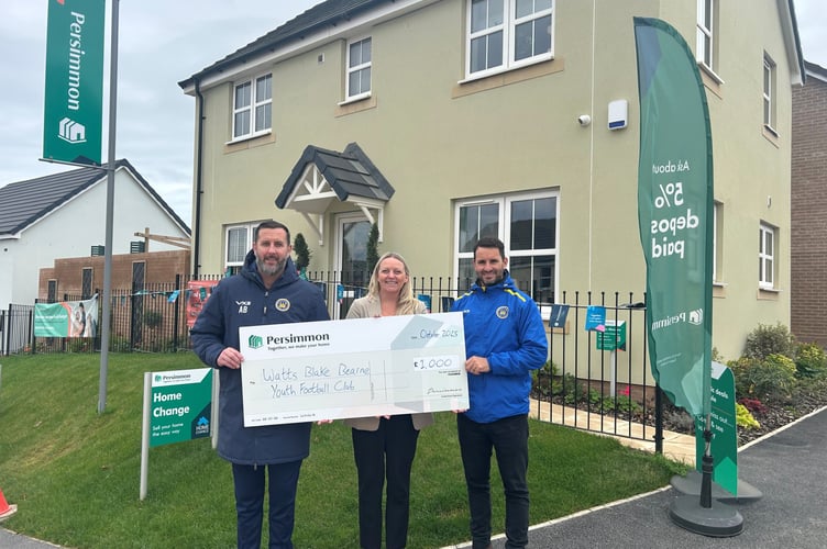 WBB youth football club receives a donation for new kit. 