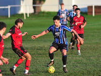 Cully conquer the 10 men of Newton Spurs