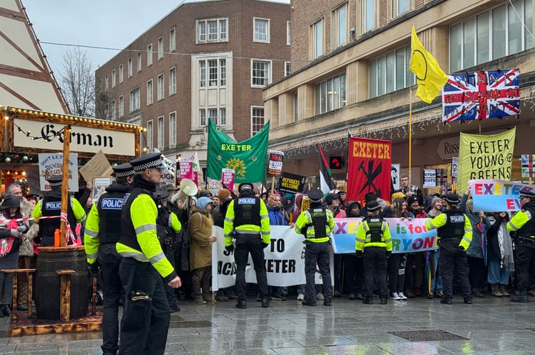 Exeter is for Everyone campaigners lined up to greet the British Unity Walk.  AQ 8766
