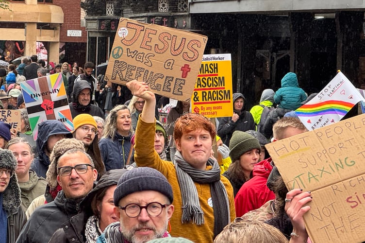 Jesus was a refugee read one of the Exeter is for Everyone placards.  AQ 8710
