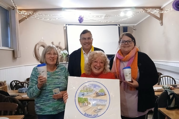 Vanessa Ryley from Dawlish Against Plastic, artist Tessa Challenger with MP Martin Wrigley and County Councillor Rosie Dawson launch the new Dawlish cup. Photo Dawlish Against Plastic 