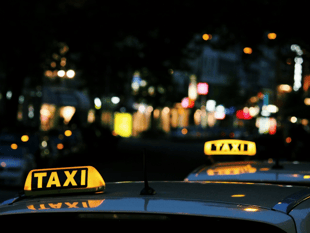 Taxi driver stripped of licence after making video call