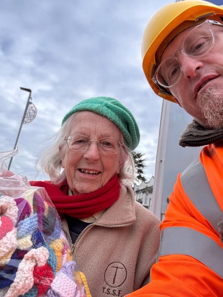 Cllr Scott Williams and Ann Leigh with the knitted 'chain reaction' in Dawlish. Photo Scott Williams 