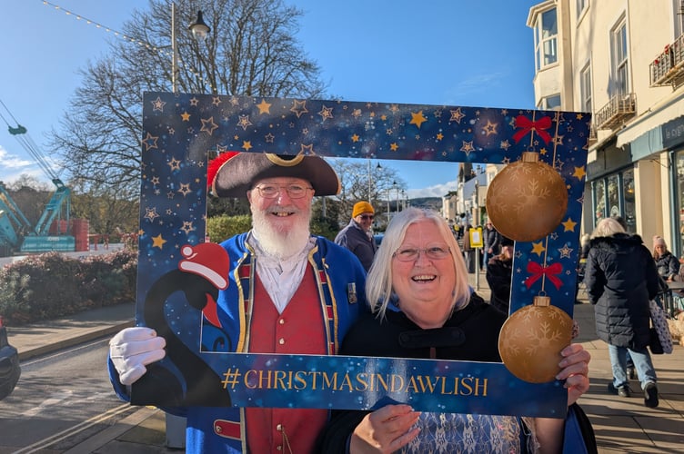 Dawlish Town Crier Bob Graham and his consort Heather at the Dawlish Christmas festivities. Photo Dawlish Chamber of Trade