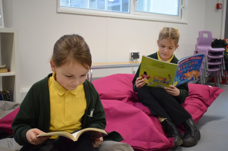Children enjoying the library facilities at Kenton School. Photo Kenton School 