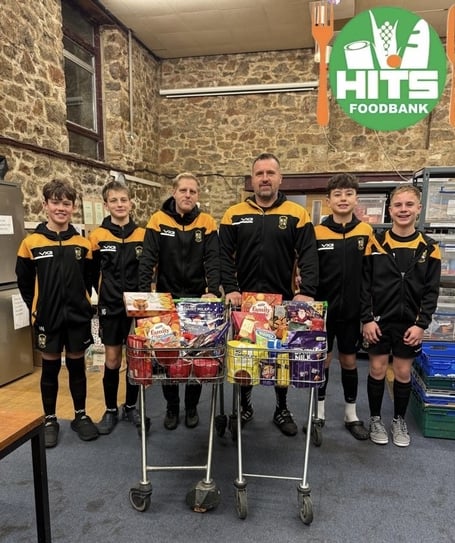 Players from Buckland Athletic U14s with manager Gary Fisher at HITS. 