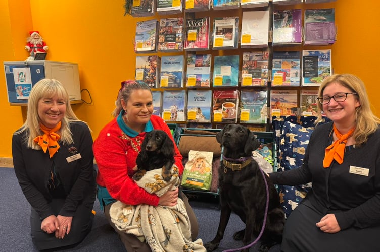 Dogs from Foredown Kennels visit Hays Travel in Newton Abbot. Photo Hays Travel