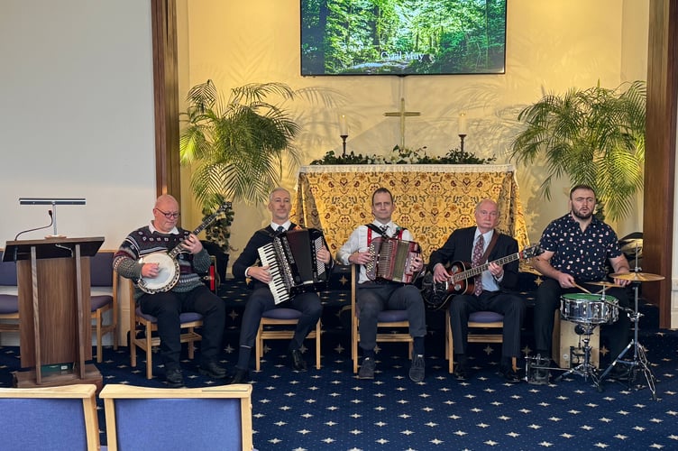 Dartmoor Pixie Band members playing at the funeral of Cyril May at Exeter and Devon Crematorium. AQ 1130