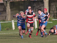 Teigns toppled by runaway league leaders
