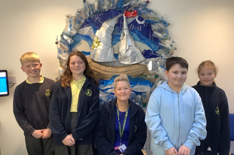 Starcross Primary School logo made from recycled materials. Photo contributed 