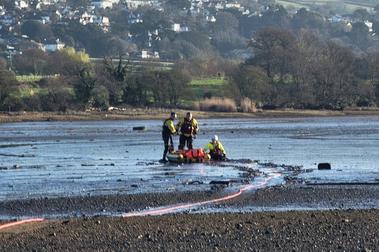 Dawlish coastguards practice their mud rescue techniques. Photo Dawlish Coastguards 