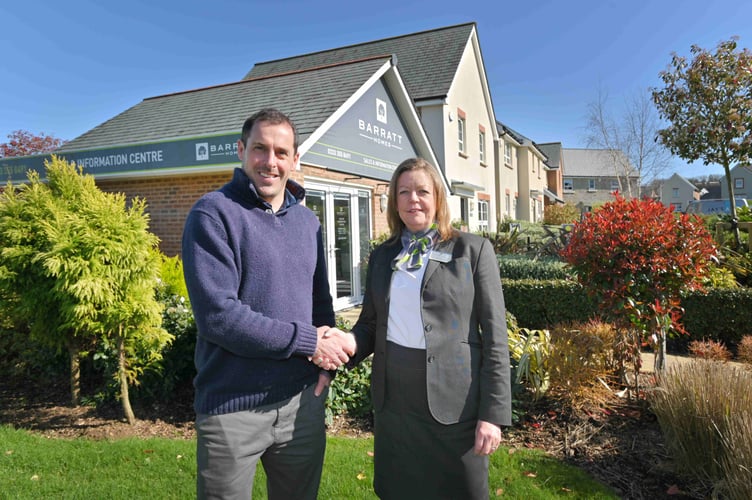 Dan Osbourne, CEO of Jay's Aim receives a donation from Barratt Bristol. Photo contributed 