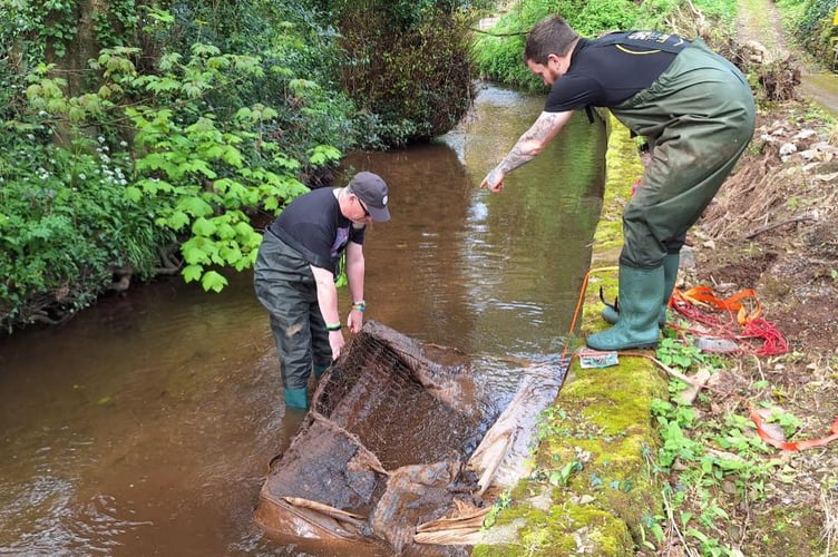 A mattress and car seats were dumped in the Brook at Dawlish. Photo Dawlish Chamber of Trade 
