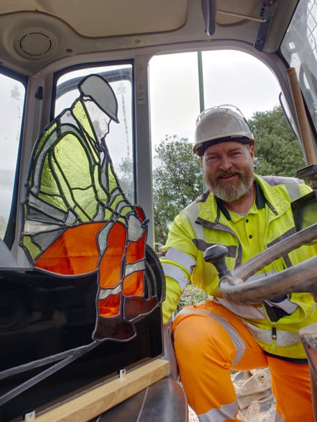 John Cuddy, contractor for SWW in Dawlish, with his stained glass artwork. Photo SWW