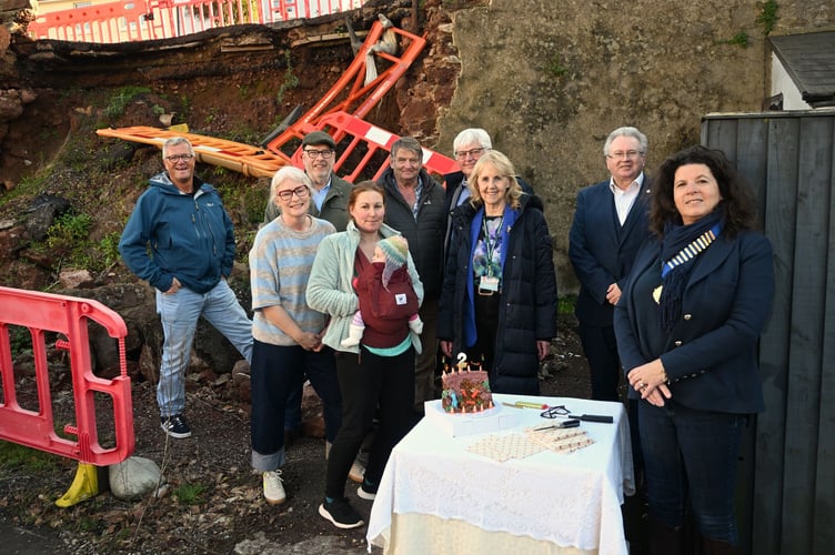 Shaldon Parish Council's 'party' to mark two years since temporary traffic lights were installed following the collapse of a wall. photo contributed 