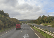 Overturned trailer causing delays on A38