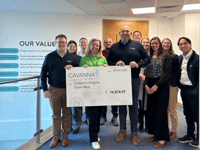 House builder donates nearly £15k to charity