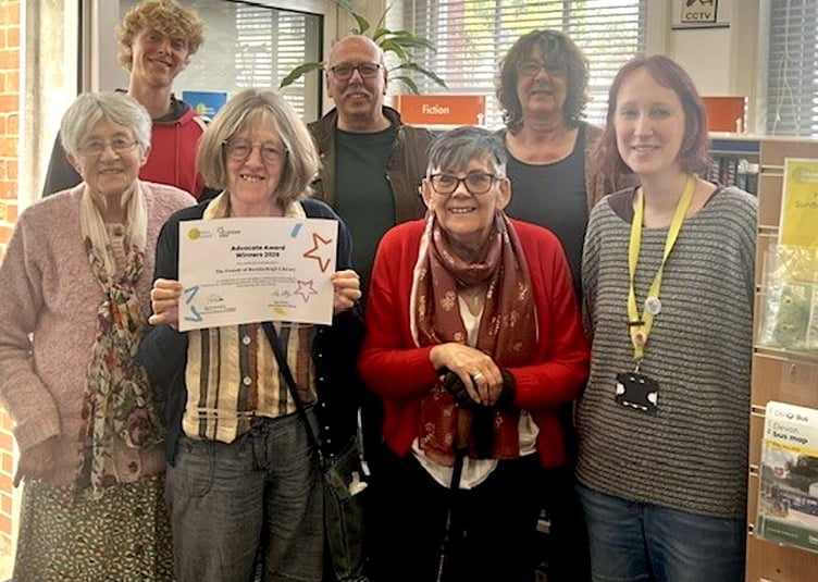 Friends of Buckfastleigh Library with award certificate for Volunteer Advocate