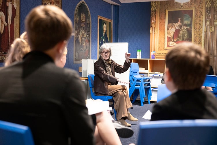 Teignmouth pupils question Baroness McIntosh during visit to the House of Lords