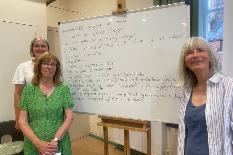 Whiteboard notes of discussion after National Emergency Briefing film screening in Bishopsteignton, with members of parish council's Climate Impact Action group