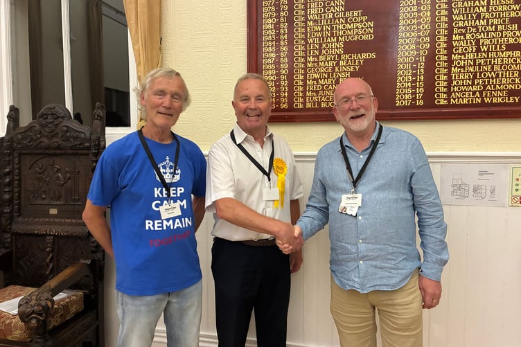 Pictured in the council chamber at Dawlish Manor House following the by-election result, left to right, town councillor Gary Taylor, district councillor Pat Hackett with Teignbridge Council leader Richard Keeling. Photo supplied