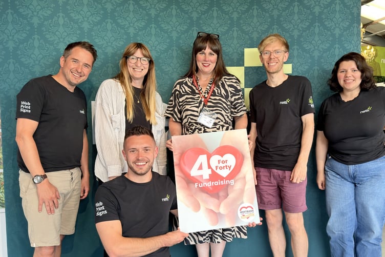 Katie Elliott, from Westbank, with the team at Nettl Exeter-based design company, the first to pledge its support, to a new fund raising campaign. Photo contributed