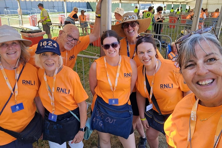 Teignmouth RNLI fundraising volunteers at the 'Live at Powderham' Teddy Swims concert