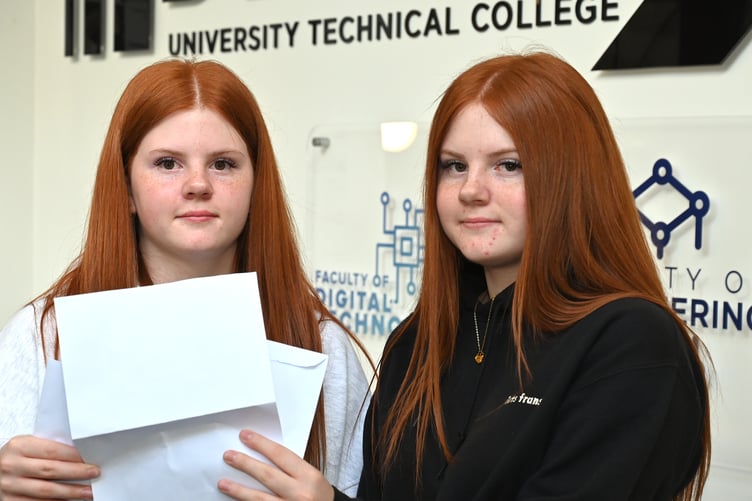 GCSE results day. Students at South Devon University Technical College. Twins Daisy and Lily Walker who were studying Health and Social Care and Engineering respectively, check out their results